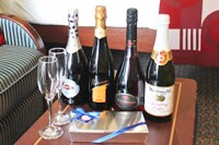 Bon Voyage
- An opulent selection of Champagne and praline-mix chocolates. Martinelli's Sparkling Cider is also available.
Bon Voyage
- An opulent selection of Champagne and praline-mix chocolates. Martinelli's Sparkling Cider is also available.