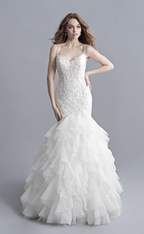 A woman wearing the Ariel wedding gown from the 2020 Disney Fairy Tale Weddings Platinum Collection