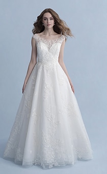 A woman in the Snow White wedding gown from the 2020 Disney Fairy Tale Weddings Collection
