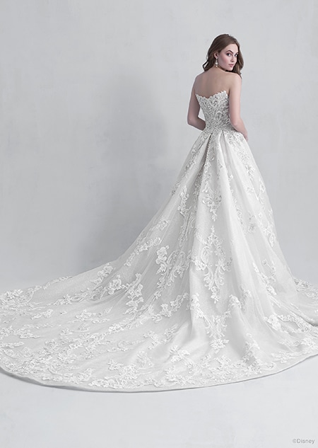 A back side view of a woman wearing the Aurora wedding gown from the 2021 Disney Fairy Tale Weddings Platinum Collection
