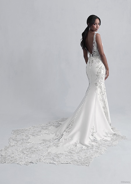 A back side view of a woman wearing the Jasmine wedding gown from the 2021 Disney Fairy Tale Weddings Platinum Collection
