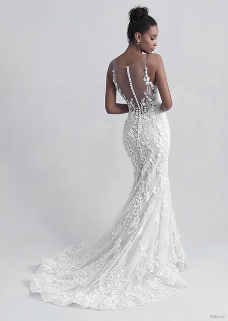 A back side view of a woman in the Tiana wedding gown from the 2021 Disney Fairy Tale Weddings Platinum Collection A back side view of a woman in the Tiana wedding gown from the 2021 Disney Fairy Tale Weddings Platinum Collection