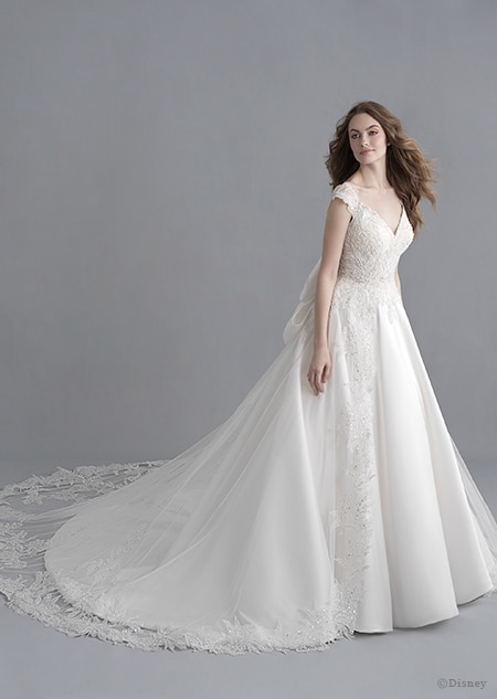A woman wearing the Snow White wedding gown from the 2020 Disney Fairy Tale Weddings Platinum Collection A woman wearing the Snow White wedding gown from the 2020 Disney Fairy Tale Weddings Platinum Collection