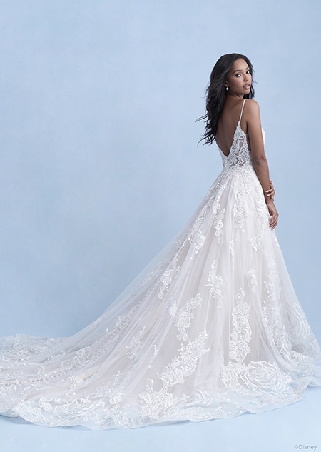A back side view of a woman wearing the Belle wedding gown from the 2021 Disney Fairy Tale Weddings Collection