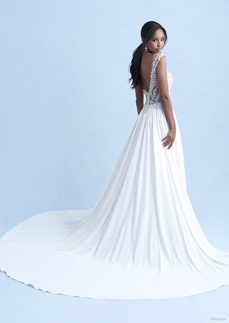 A back side view of a woman wearing the Jasmine wedding gown from the 2021 Disney Fairy Tale Weddings Collection