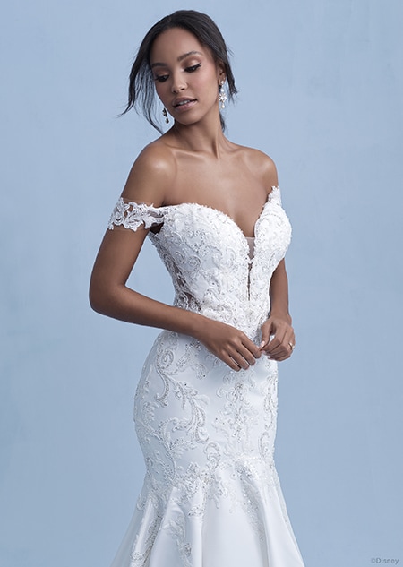 A woman in the Jasmine wedding gown from the 2021 Disney Fairy Tale Weddings Collection