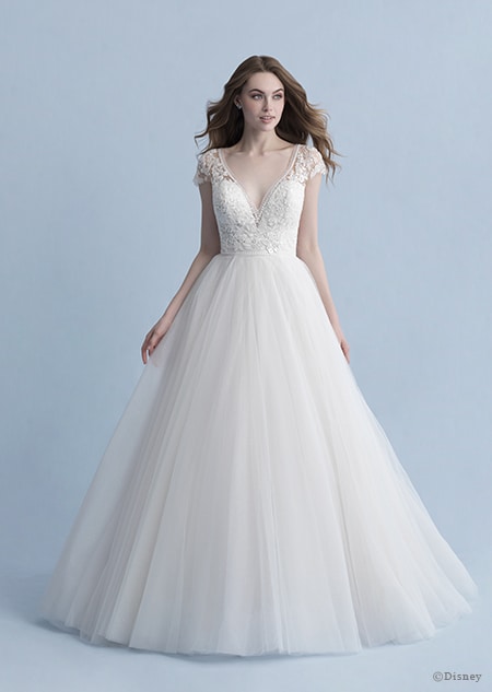A woman wearing the Cinderella wedding gown from the 2020 Disney Fairy Tale Weddings Collection