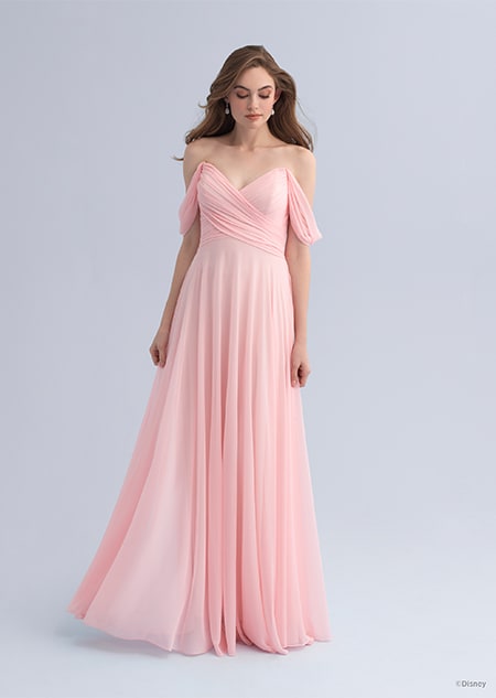 A woman wearing an Aurora themed bridesmaid dress