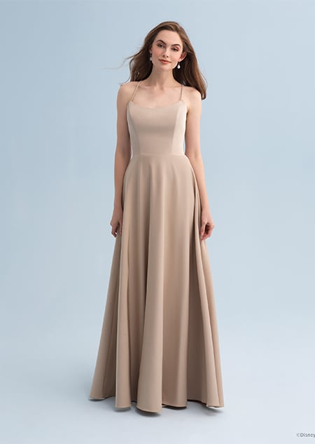 A woman wearing a Belle themed bridesmaid dress with a scoop neckline