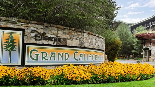 A stone wall featuring a sign that says 