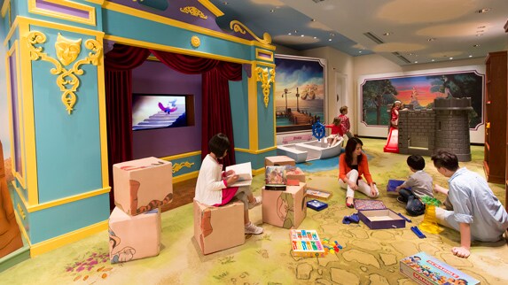 Children and parents playing in the Kids' Play Area at Disney's Hollywood Hotel