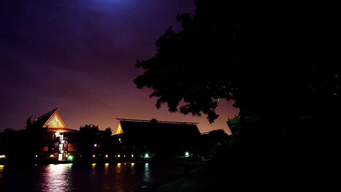 The exterior of Disney's Polynesian Villas & Bungalows at night