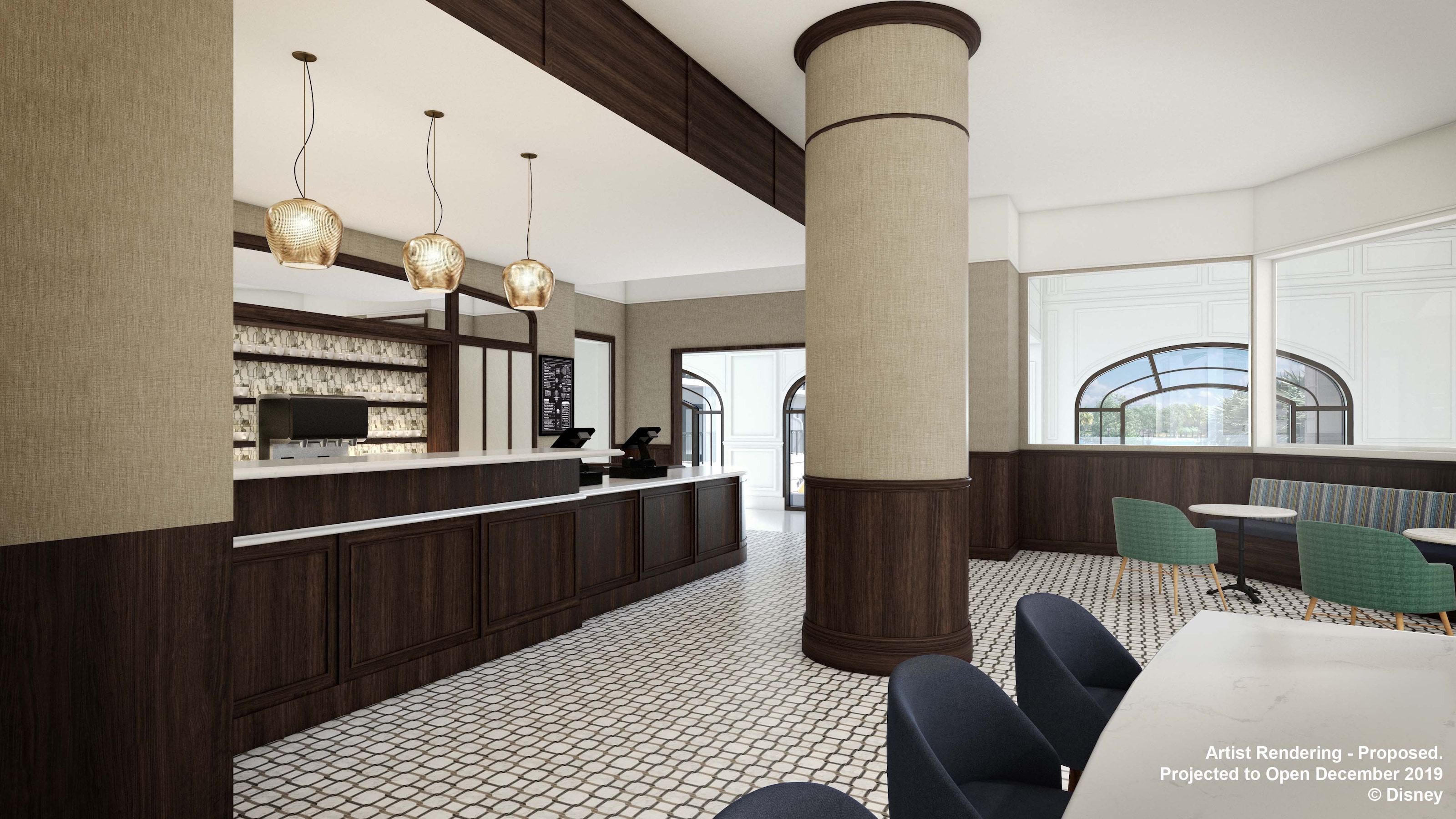 The interior of Le Petit Café, featuring tables, chairs and a long countertop