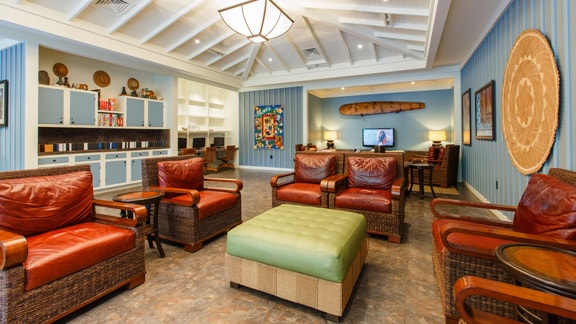 A lounge area in the Pau Hana Room, an activities room at Aulani, A Disney Resort & Spa