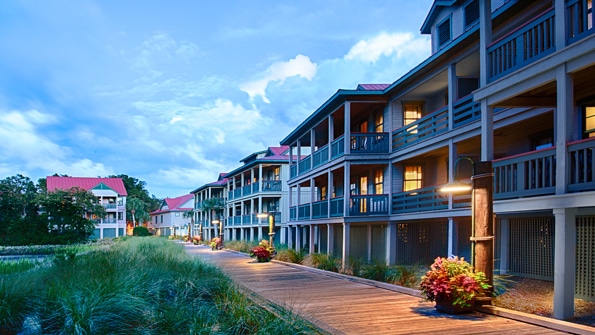 Buildings at Disney's Hilton Head Island Resort, overlooking a walkway and grassy marsh