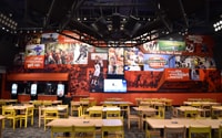 A dining room with pictures of athletes on the wall at ESPN Wide World of Sports Grill